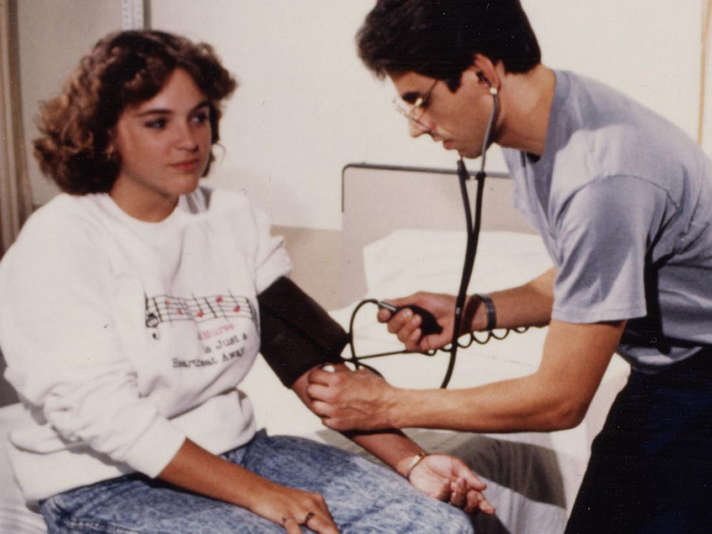 Medical Student taking blood pressure
